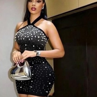 Robe noire perlée, photo tirée d'un statut de revendeuse